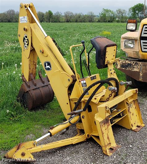 john deere skid steer backhoe attachment|john deere backhoe attachment models.